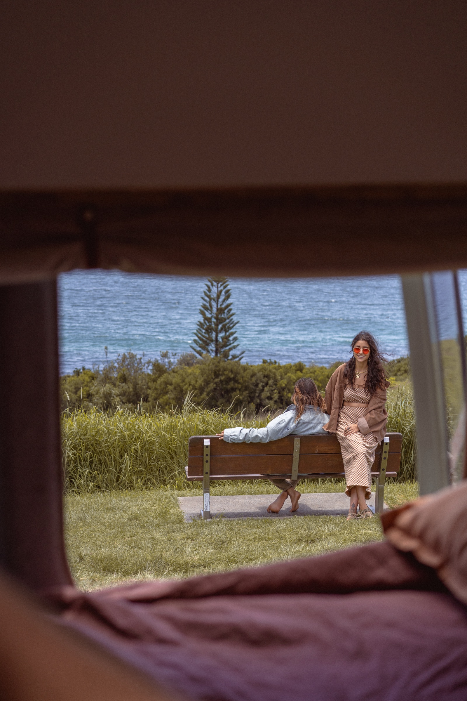 Family and ocean framed by Sage